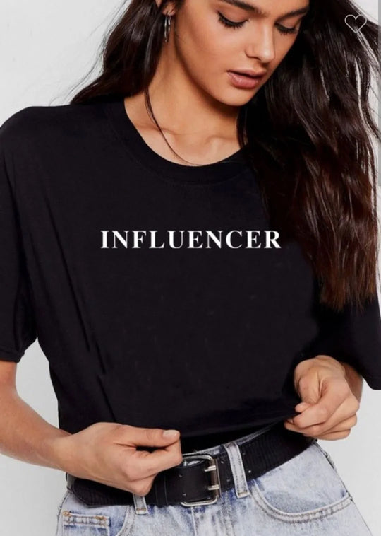 Stylish 'Influencer' Statement Graphic Tee from Baddie Galore Fashion showcasing confidence and boldness in fashion. Perfect addition to your wardrobe of Statement Graphic Tees.